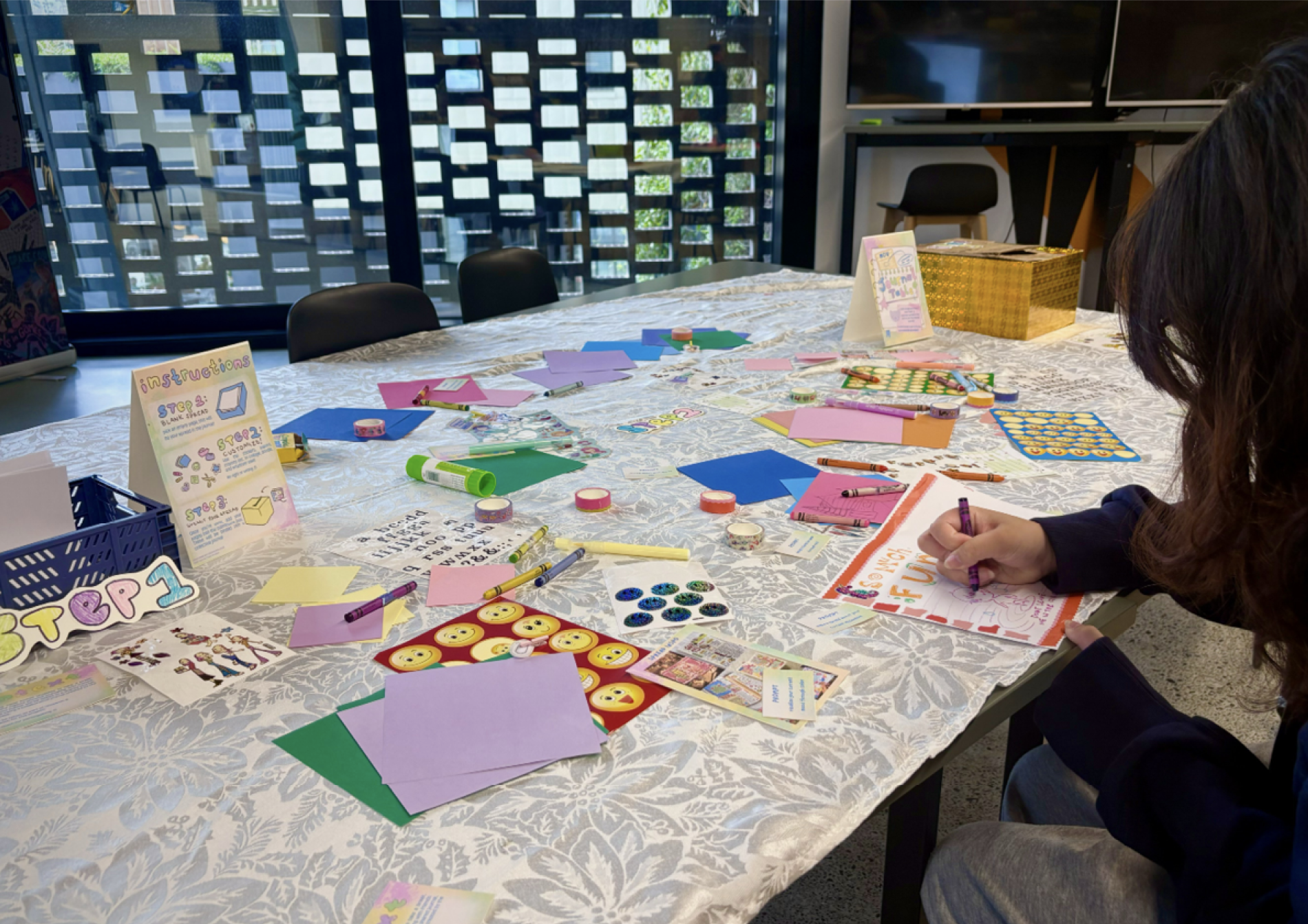 Attendee completing a journal spread